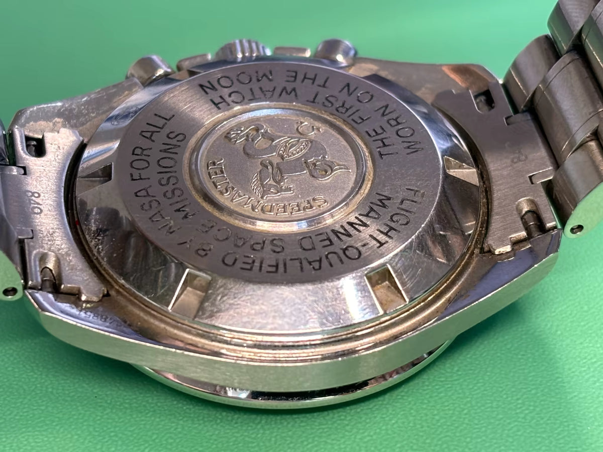 Omega Speedmaster Professional Moonwatch caseback engraved with its NASA flight-qualified inscription.