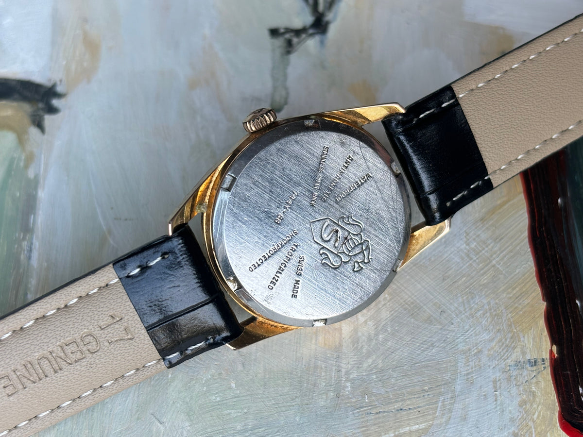 Rear view of the Favre-Leuba Genève Sea King showing the caseback and black leather strap.