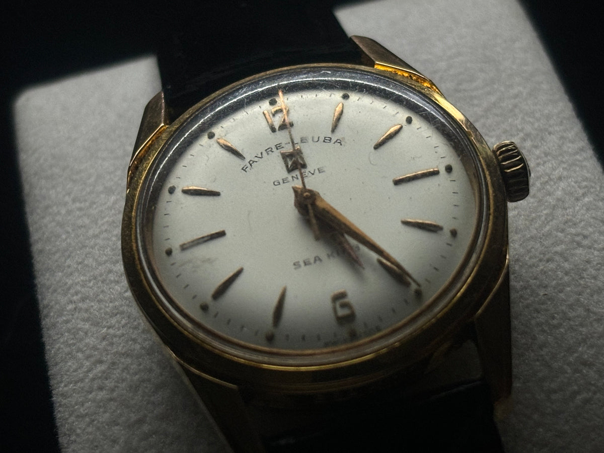 Three-quarter front studio view of the Favre-Leuba Genève Sea King vintage dress watch.