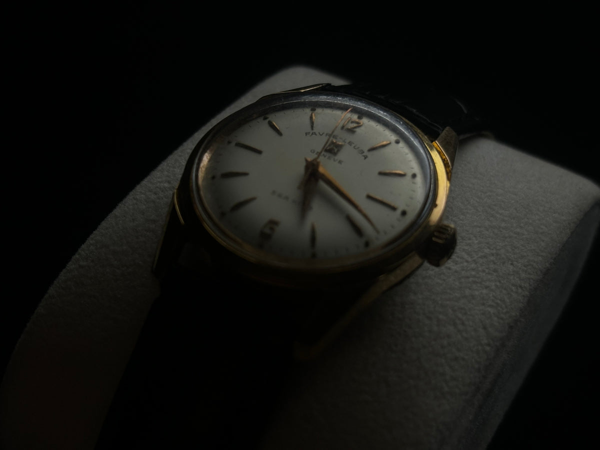 Studio three-quarter view of the Favre-Leuba Genève Sea King vintage dress watch.
