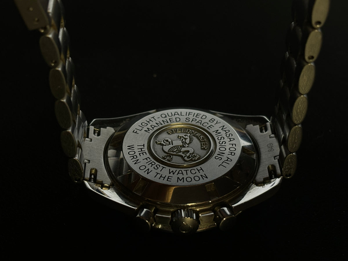 Studio view of an Omega Speedmaster Professional Moonwatch caseback with Moonwatch engraving.