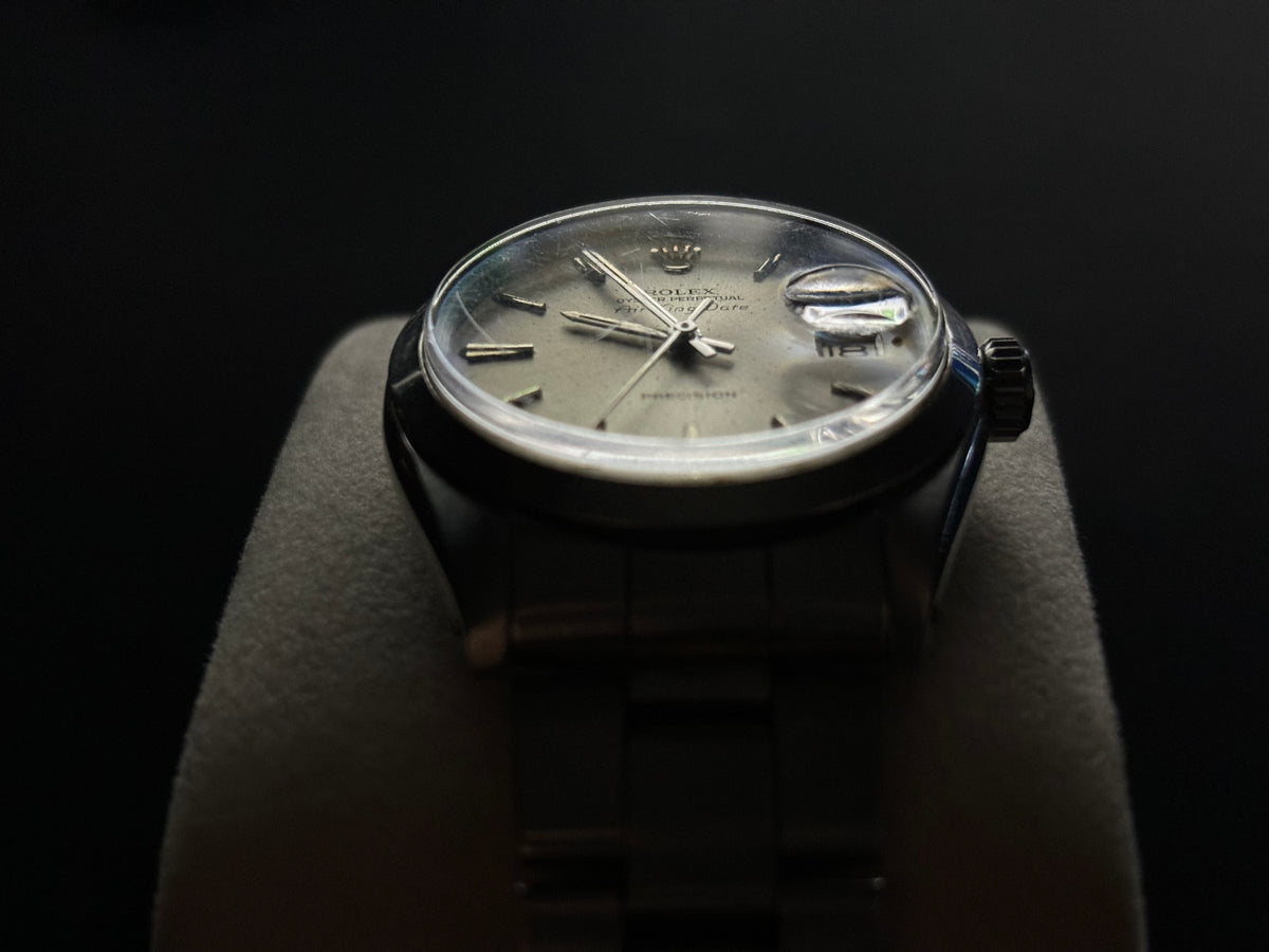 Front studio view of Rolex Air-King-Date Precision ref. 5700 on stainless-steel Oyster bracelet
